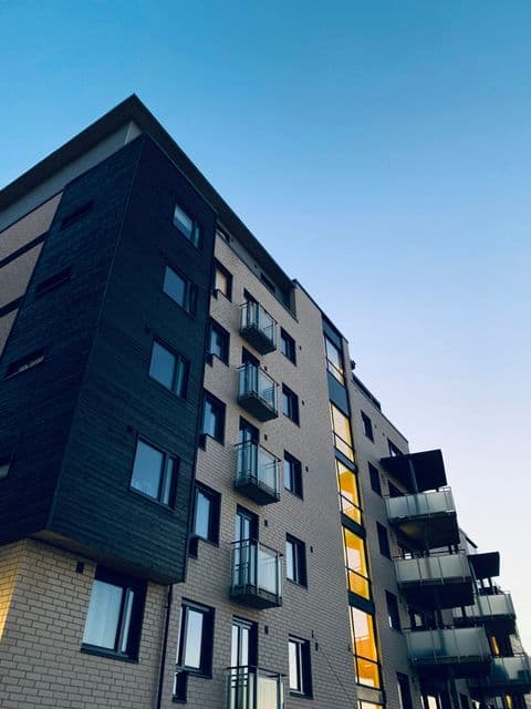 Contemporary building with dark structural glazing